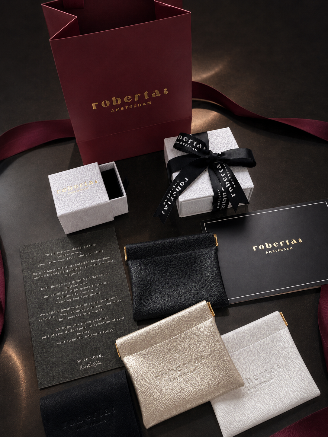 Roberta Amsterdam gift packaging with jewelry pouches, ribbon and handwritten note
